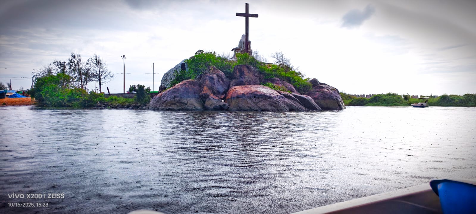 Backwater rock shrine seen from the boat